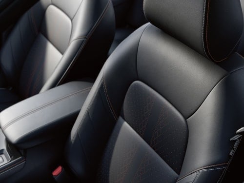 2026 Nissan Altima front seat and console with leather details.