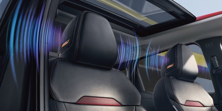 2027 Nissan Kicks detail view of Bose speakers in front headrests