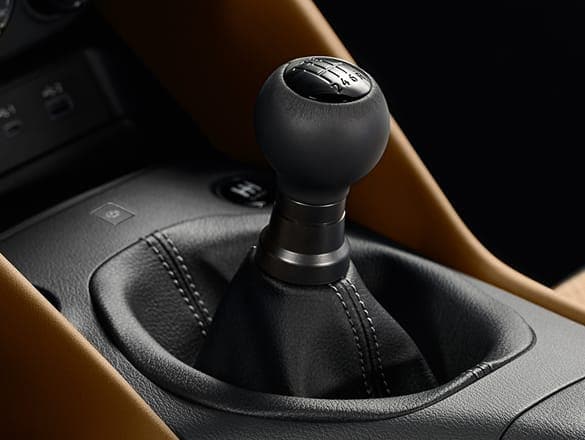 2027 Nissan Z interior showing manual transmission gear shifter.